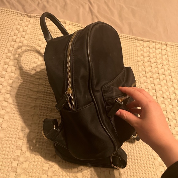 mini black backpack perfect condition with gold buckle and zipper detail - Picture 2 of 4
